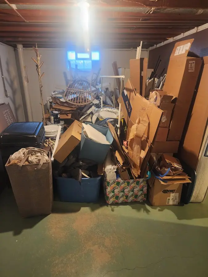 Roll-off dumpster container at job site for 2 Yard Dumpster Rental in Webster Groves